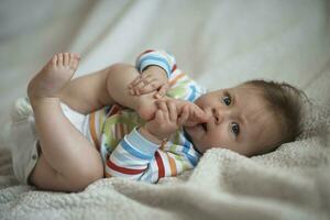 cute  little  newborn baby smilling photo