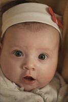 portrait of happy newborn little baby smilling photo