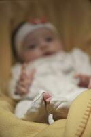 portrait of happy newborn little baby smilling photo