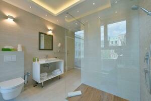 minimalistic bathrom in modern hotel photo