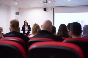 businesswoman giving presentations at conference room photo