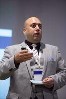 businessman giving presentations at conference room photo