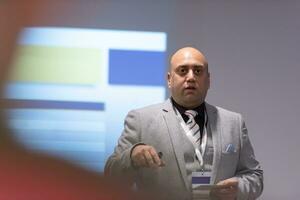 businessman giving presentations at conference room photo