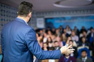 businessman giving presentations at conference room photo