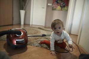 cute  little one year old baby and making first steps photo