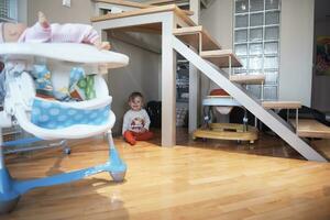 cute  little one year old baby and making first steps photo