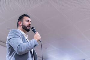 businessman giving presentations at conference room photo