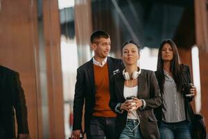 Elegant businesspeople walking in a modern city.. photo