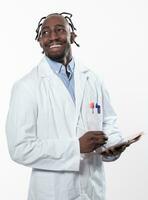 Doctor dark skin guy virologist agent corona virus seminar conference arms crossed pandemic virus expert wear white lab coat isolated white color background using a tablet computer. photo