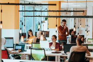 Multiethnic group of employees working in a marketing company. A group of colleagues is working on a project in modern offices photo