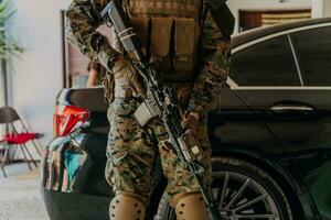 American marine corps special operations soldier preparing tactical and commpunication gear for action battle closeup photo