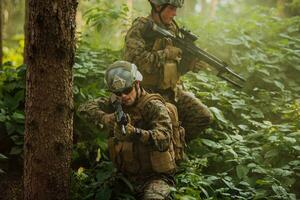 A group of modern warfare soldiers is fighting a war in dangerous remote forest areas. A group of soldiers is fighting on the enemy line with modern weapons. The concept of warfare and military conflicts photo