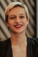 Pretty businesswoman, successful confidence in a modern coffe shop. Selective focus photo