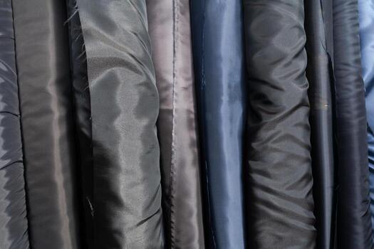 colección de de moda telas muestras de diferente natural telas para de coser un Moda colección de ropa. grande selección de telas en el Tienda o Sastre depósito. foto