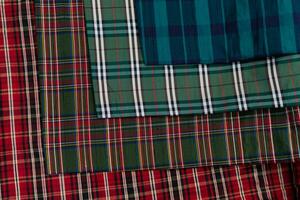 colección de escocés de moda telas . muestras de diferente natural telas para de coser un Moda colección de ropa. grande selección de telas en el Tienda o Sastre depósito. foto