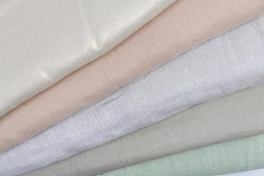 colección de de moda telas muestras de diferente natural telas para de coser un Moda colección de ropa. grande selección de telas en el Tienda o Sastre depósito. foto