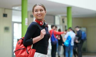 famel student with modern technology in school photo