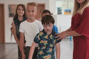 Preschool children wait in line for new and interesting games. Selective focus photo