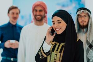 Group portrait of muslim businessmen and businesswoman photo