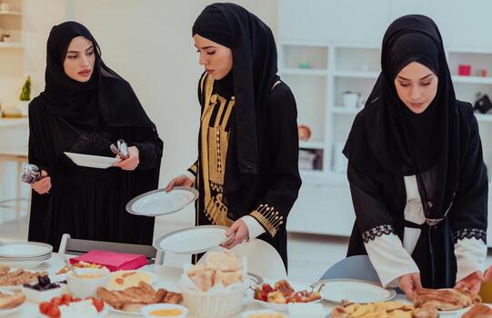 Eid Mubarak Muslim family having Iftar dinner young muslim girls serving food on the table during Ramadan feasting month at home. The Islamic Halal Eating and Drinking Islamic family photo