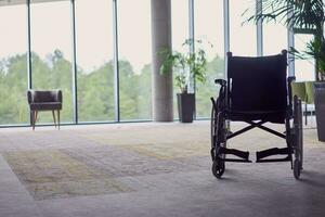 A wheelchair in a modern, spacious office, symbolizing inclusivity and accessibility for business meetings. photo