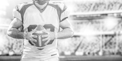 closeup American Football Player isolated on big modern stadium photo