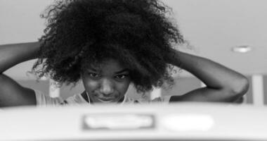 portrait of young black woman in gym photo