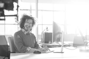 businessman working using a computer in startup office photo