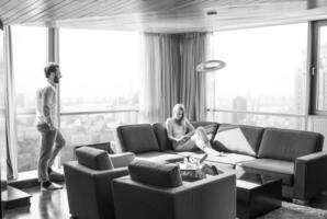 couple relaxing at  home using tablet computer photo
