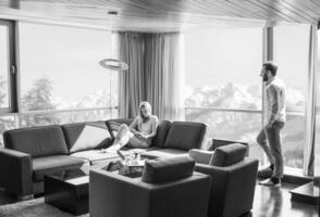 couple relaxing at  home using tablet computer photo