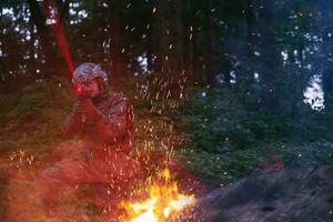 Soldier in Action at Night photo