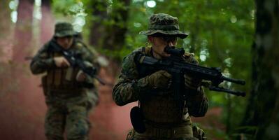 Modern warfare Soldiers  Squad  in battle photo