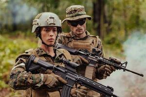 Modern Warfare Soldiers Squad Running in Tactical Battle Formation Woman as a Team Leader photo