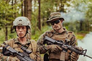 Modern Warfare Soldiers Squad Running in Tactical Battle Formation Woman as a Team Leader photo