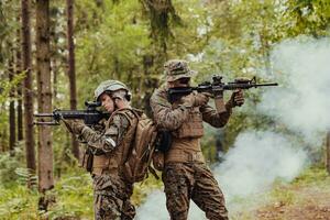 Modern Warfare Soldiers Squad Running in Tactical Battle Formation Woman as a Team Leader photo