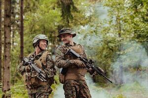 Modern Warfare Soldiers Squad Running in Tactical Battle Formation Woman as a Team Leader photo