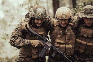 Modern warfare military squad in battle action rescue wounded soldier help and support concept photo