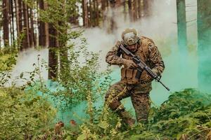 A modern warfare soldier on war duty in dense and dangerous forest areas. Dangerous military rescue operations photo