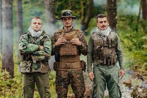 Group of soldiers in oposit sides celebrating peace after battle photo