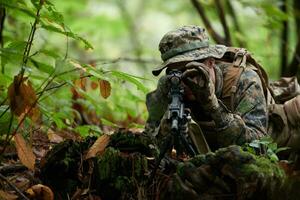 soldier in action aiming  on weapon  laser sight optics photo
