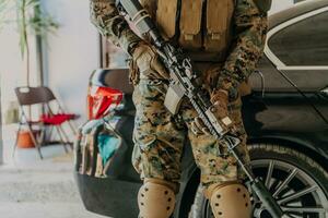 American marine corps special operations soldier preparing tactical and commpunication gear for action battle closeup photo