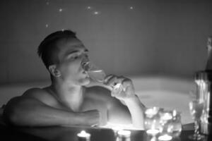 man relaxing in the jacuzzi photo