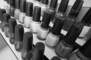 Set of different bottles of nail polish photo