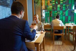 business couple having dinner photo