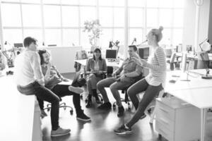 Young Business Team At A Meeting at modern office building photo