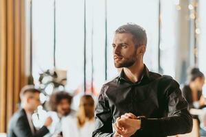 Cheerful self confident professional businessman with crossed hands portrait. photo