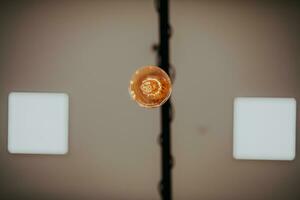 Light bulb illuminated and taken from above photo