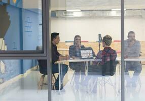 startup business team on meeting at modern office photo