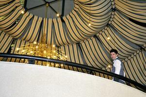 indoor portrait of young and happy  businessman photo