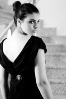 lady on black dress look back photo